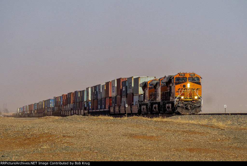 BNSF 8183 leads westbound stacks